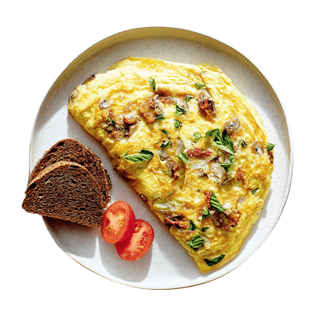 Omlet z suszonymi pomidorami, pieczarkami i bazylią