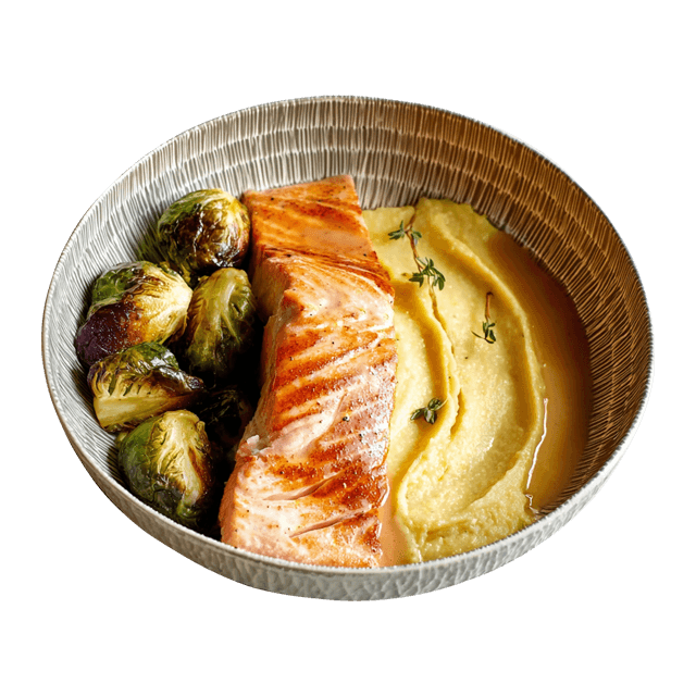 Łosoś w glazurze z syropu klonowego z miodową polentą i brukselką